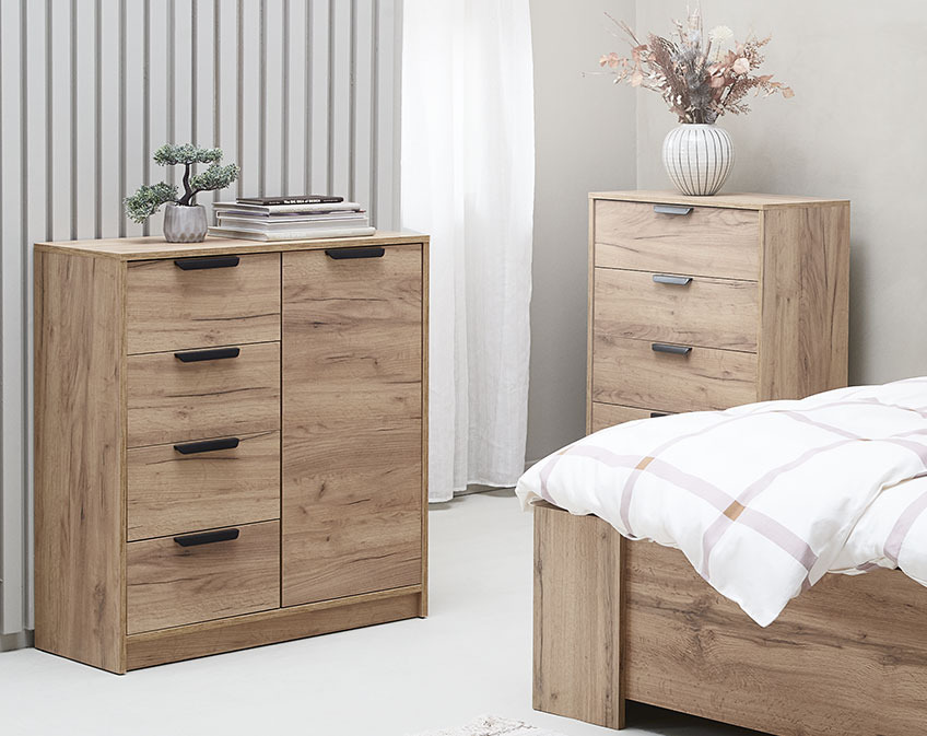 Two different chests of drawers in a bedroom 
