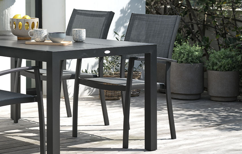 Garden table and garden chairs on patio