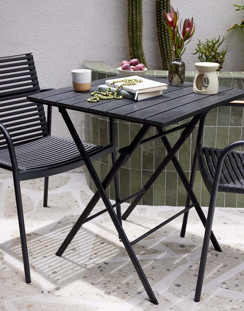 Bistro set or cafe set with outdoor table and two chairs 