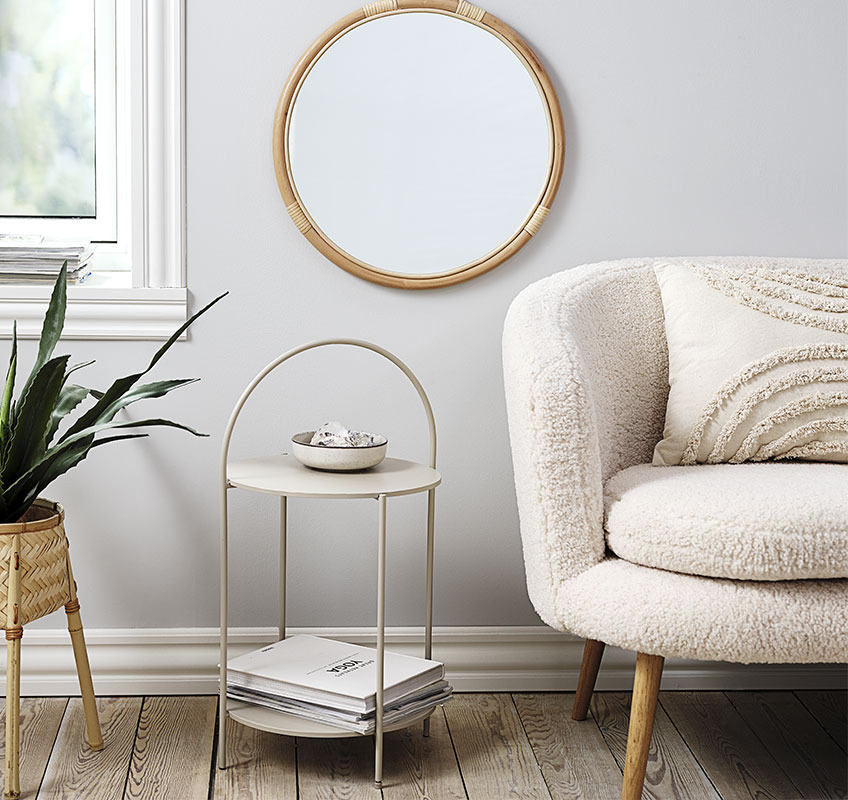 HALBY end table and REFLECT mirror Round end table in light beige and round mirror in rattan