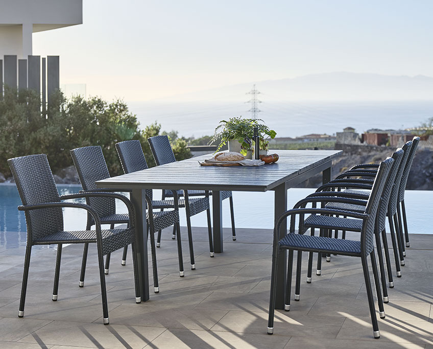 VATTRUP garden table includes 2 extension leaves, which can be stored under the table top Extendable garden table with room for eight people